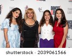Small photo of Natasha Capp, Mary Reynard, Raffaela Capp, Tori London attend 24th Dances with Films Festival World Premiere of "Four Cousins And A Christmas" at TCL Chinese Theater, LA, CA on September 8, 2021