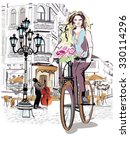 Fashion Girl Rides A Bicycle...