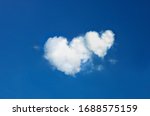 Twin Clouds Shaped Heart On...