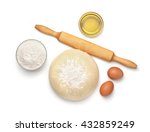 Top view of dough and baking  ingredients isolated on white