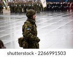 Small photo of Tallinn, Estonia - February 24 2023: Estonian soldier commander is leading a platoon marching during the military parade due to a national holiday Anniversary of the Republic of Estonia.