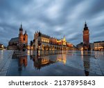 Krakow main square with reflections of St mary