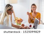 Small photo of Doctor nutritionist, dietician and female patient on consultation in the office. young smiling female nutritionist in the consultation room. Nutritionist desk with healthy fruit and measuring tape.