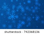 Snowflakes On A Blue Background