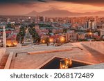 Small photo of 25 May 2021, Yerevan, Armenia: Scenic evening view from the stairs of Cascade monument to the colorful sunset over rooftops of Yerevan city and symbol of Armenia - Mount Ararat