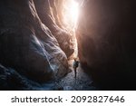 Small photo of Happy alone woman wearing helmet for safety is engaged in active canyoning and hiking along the Saklikent Gorge in Turkey. New experience and outdoor leisure recreation