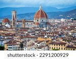 awe-inspiring panoramic view of Firenze (Florence) at sunset, taken from Piazzale Michelangelo.
historical landmarks, including the iconic Duomo and Palazzo Vechio,  can be seen at distance