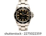 Small photo of Miami, FL, USA March 6, 2023 Tudor Oyster Prince Submariner Snowflake 94010 showing the dial