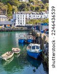Small photo of Boats in the harbour at Polperro, a charming and picturesque fishing village in south east Cornwall. It is a truly delightful place to visit.