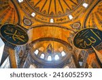 Small photo of Istanbul,Turkey , October 3, 2019 - Mosaic of Virgin Mary and Infant Jesus high over the inner sanctum of the Hagia Sophia, landmark 6th centure byzantine church built by Justinian at Istanbul, Turkey