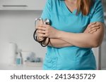 Small photo of Doctor holds his stethoscope to insinuate that it's time for a check up, professional emergency healthcare assistance service concept. Professional doctor ready to listen lungs or heart.