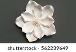 White Artificial Flower On Grey ...
