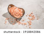 pink himalayan salt, in bowl on white background