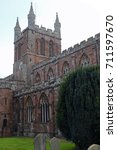 Small photo of The twelfth century Crediton parish church in Devon UK, formerly known as the Church of the Holy Cross and the Mother of Him who Hung Thereon - one of the more unusual UK church names