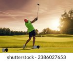 Small photo of Golfer on a golf course, ready to tee off. Golfer with golf club hitting the ball for the perfect shot.