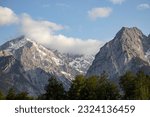 Small photo of Alps, mountains with stormy skies, leaden heavy skies, Berge in evening