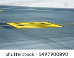 Marking for ground transportation on the airport apron among taxiways
