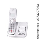 Cordless phone on a white...