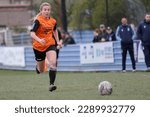Small photo of Darcie Greene of Brighouse Town goes on an attacking run during the FA Women's National League match at Plumpton Park, Eccleshill United, Bradford, England on April 16th, 2023.