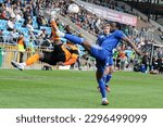 Small photo of Vincent Harper of Eastleigh FC makes a bicycle kick against Millenic Alli of FC Halifax Town at The Shay Stadium in Halifax, England on April 29th 2023.