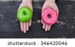 Choosing Between Apple And Donut