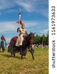Small photo of MINSK, REPUBLIC OF BELARUS - JUNE 02, 2018: IV Festival of historical reconstruction "The Age of Chivalry". Performances of cavalry knights on horses.