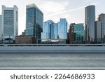 Small photo of Empty urban asphalt road exterior with city buildings background. New modern highway concrete construction. Concept of way to success. Transportation logistic industry fast delivery. Boston. USA.