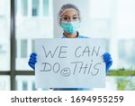 Healthcare worker holding...