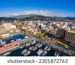 Hobart waterfront and CBD in front of snow capped Mount Wellington, from the air