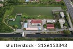 Small photo of PENANG, MALAYSIA - 16 March 2022: Aerial view of water pump station, supply and control for paddy fields plantation. Manage by Jabatan Parit Dan Saliran Seberang Perai Utara (JPS SPU ).