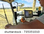 Small photo of Mikhailovka, Ukraine - August 25: Self-Propelled Forage Harvester John Deere 8300 and truck. Harvesting and processing in forage near the village Mikhailovka, , Central Ukraine August 25, 2017