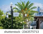Small photo of Dana Point, CA, USA - September 18, 2023: The Street of the Amber Lantern sign in Dana Point's Historic Lantern District.