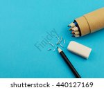 Small photo of Eraser deleting word finicky
