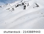 Snowy Slopes With Ski Riders In ...