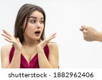 Small photo of Rude man behaviour. Close up shot of girl completely shocked by her boyfriend attitude as he shows a zilch saying that she is going to get zero nothing.