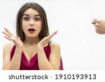 Small photo of Rude man behaviour. Close up shot of girl completely shocked by her boyfriend attitude as he shows a zilch saying that she is going to get zero nothing.