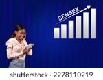 Small photo of Indian Girl Excited with Sensex Going up showing rise of indian stock market