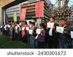 Small photo of Bangladeshi journalists hold placards with names of dead journalists as they join on International Day in Support of Palestinian Journalist in Dhaka, Bangladesh, on February 26, 2024.