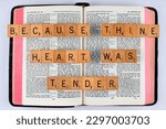 Small photo of Vancouver, BC, Canada - Circa April 2023: Scrabble letters spelling Bible Verse 2 Kings 22:19 Because thine heart was tender