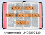 Small photo of Vancouver, BC, Canada - Circa Dec. 2023: Scrabble letters spelling Bible Verse Jeremiah 6:16 Ask for the ancient path