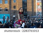 Small photo of London, UK, 2nd April 2023. The Syrian refugee girl Little Amal puppet continued her journey, to highlight the plight of displaced people, through Somers Town to Granary Square, Kings Cross, London.
