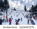 Small photo of Paltinis Arena Platos, Romania - January 11, 2020. Lots of people on a mountain slope at ski resort in Paltinis Arena Platos. Paltinis Arena Platos is a most popular ski resort in Sibiu, Romania