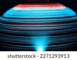 Abstract blue light trails on the blue background, motion blur effect
