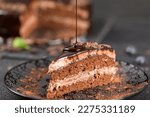 Cake decoration. Chocolate glaze. Chef decorated pie. Confectioner smears liquid chocolate glaze. Homemade baking concept