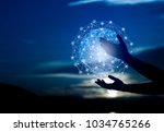 Abstract science, circle global network connection in hands on night sky background  / Blue tone concept