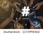 
Group of friends having fun together with smartphones - Closeup of hands social networking with mobile cellphones. concept hashtag