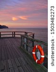 Wooden Pier With One  Red...