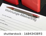 Small photo of Blank form of a rental contract for an apartment in german letters with the german word „Wohnungs-Mietvertrag“ (residential rental agreement) and then, subsequently „der Vermieter“ (the landlord) „woh