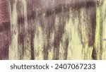 Small photo of Corroded metal background. Rusted metal wall. Rusty metal background with streaks of rust. Red or yellow Rust stain. Metal surface rusted spots