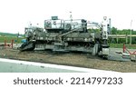 Small photo of MINNEAPOLIS, MINNESOTA USA - SEPTEMBER 03, 2021: Behemoth highway resurfacing machine.